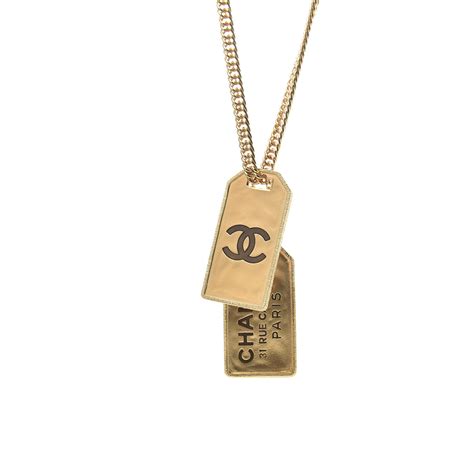 chanel dog tag necklace.